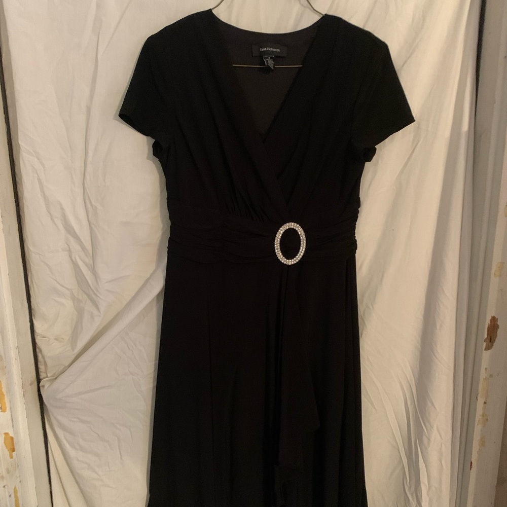 Women’s fancy black satin like dress.  Worn once! Size 6.
